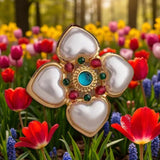 The Heart & Jewel Brooch: A timeless symbol of radiant elegance. A Sophisticated Brooch for a Special Event.
