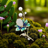 The Midnight Bloom Brooch: Enameled elegance with a pearl heart.