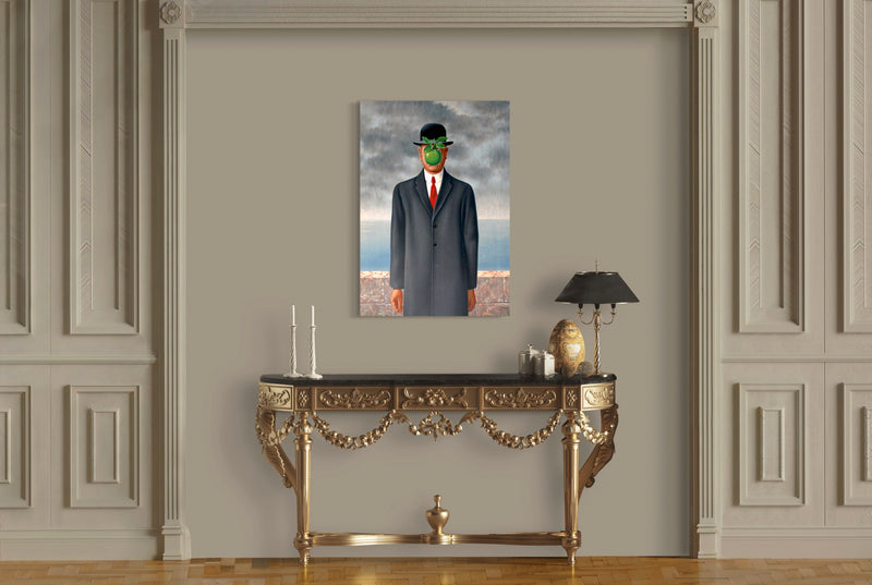 The Son of Man - Painted by Renee Margritte - Circa. 1964. High Quality Polyester Cotton Canvas Print. Ready to be Framed. Available in One Large Size. 70cm X 100cm. Stretched Canvas Option Available in One (1) Large Size - 70cm x 100