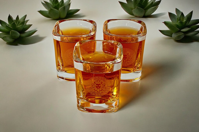 Branded Medusa! Introducing our Exquisite Set of Six Shot Glasses, exuding the Opulent Elegance Reminiscent of Versace. Crafted with meticulous attention to detail, each glass radiates beauty and sophistication. Perfect for savoring tequila or vodka.