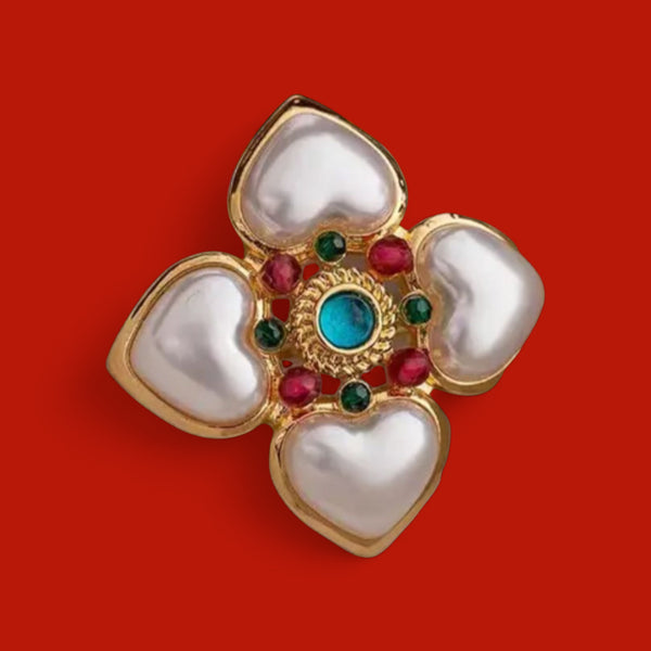 The Heart & Jewel Brooch: A timeless symbol of radiant elegance. A Sophisticated Brooch for a Special Event.