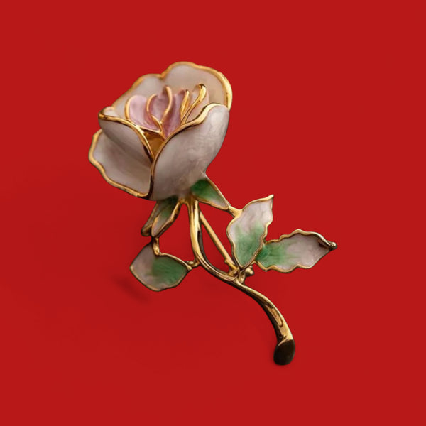 The Golden Rose Brooch: A symbol of timeless elegance.